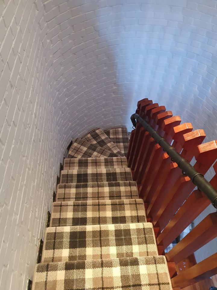 Tartan carpeted stairwell